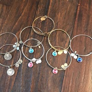 Bundle of Alex and Ani bracelets.